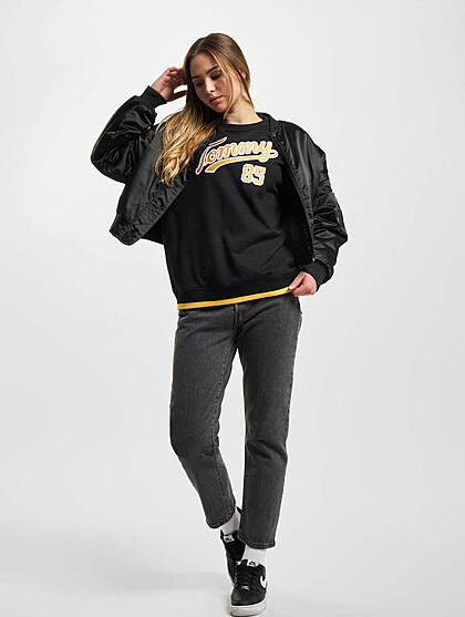 Tommy Jeans Damen Classic Sweater Pullover mit Rundhals und Logo-Stitch schwarz gelb